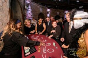 Several people get excited, enjoying casino games at a party