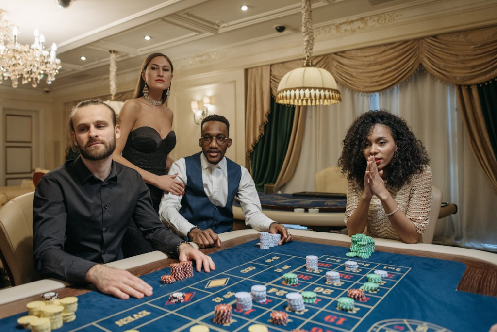 : A group of employees during a poker game at a casino-themed party